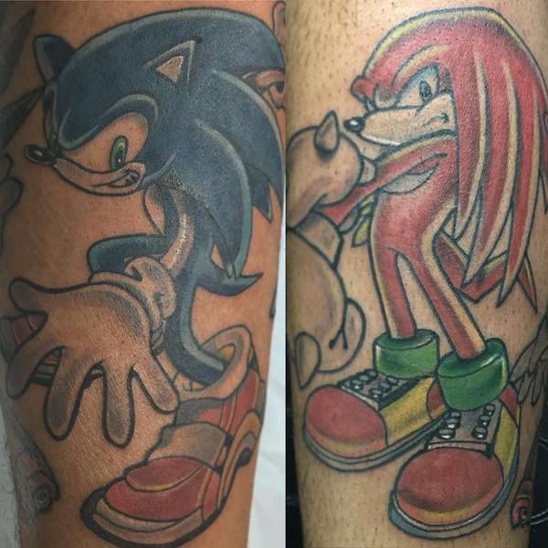 tattoo of sonic and knuckles on the calf