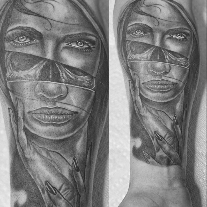 Black and grey realistic portrait tattoo on forearm