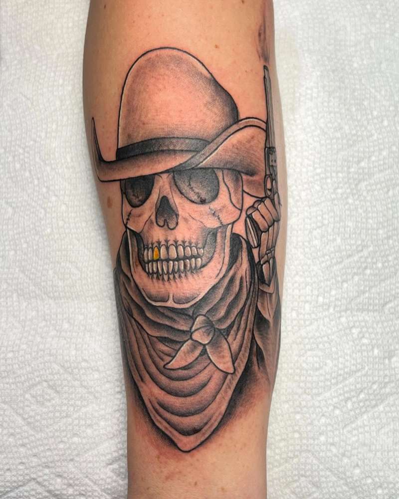 Black and grey traditional skull with cowboy hat tattoo on calf