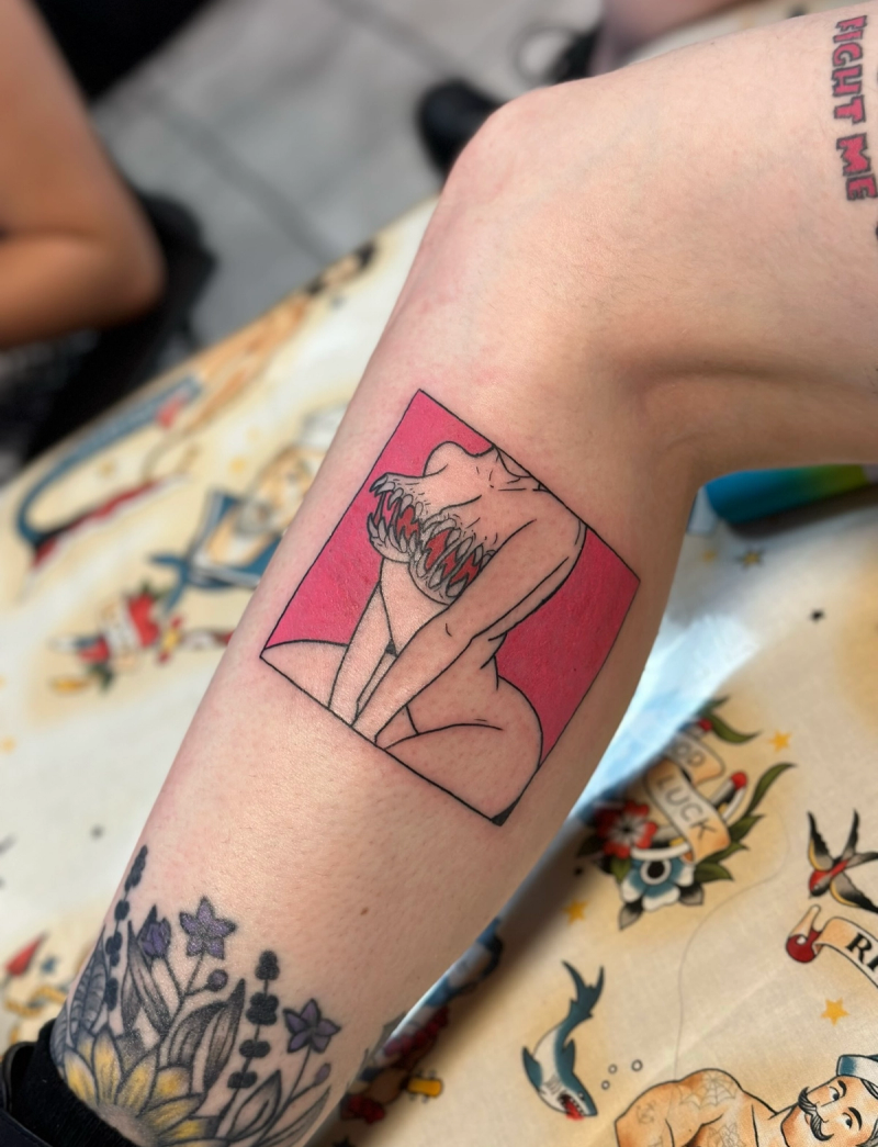 Color illustrative creature design tattoo on forearm