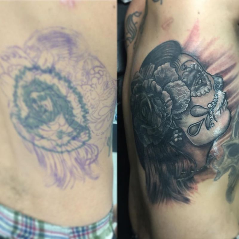 black and grey tattoo of a woman with sugar skull makeup on the side