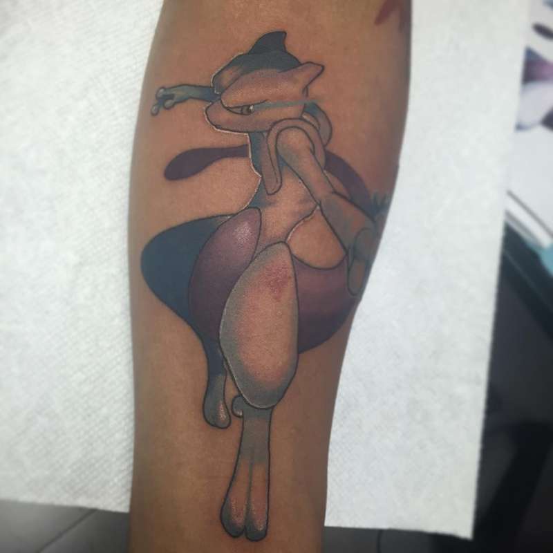 illustrative character tattoo on calf