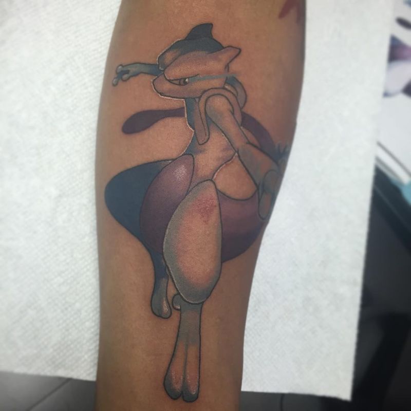 illustrative character tattoo on calf