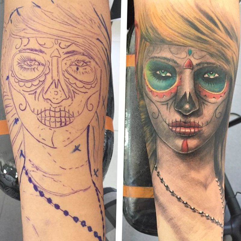 colorful sugar skull portrait on forearm