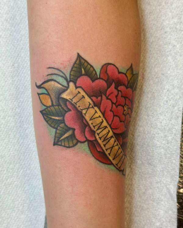 colorful traditional rose tattoo with date
