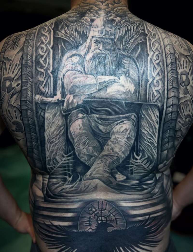 Black and grey realistic Norse god tattoo covering full back