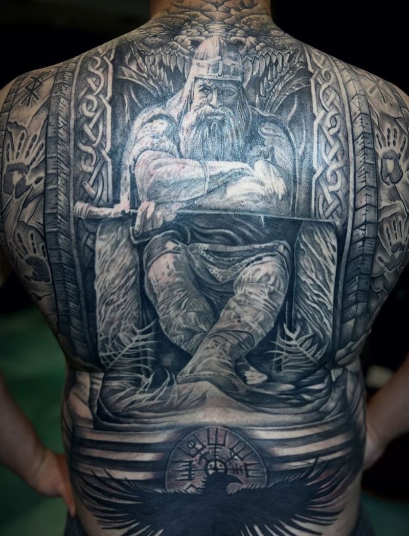 Black and grey realistic Norse god tattoo covering full back