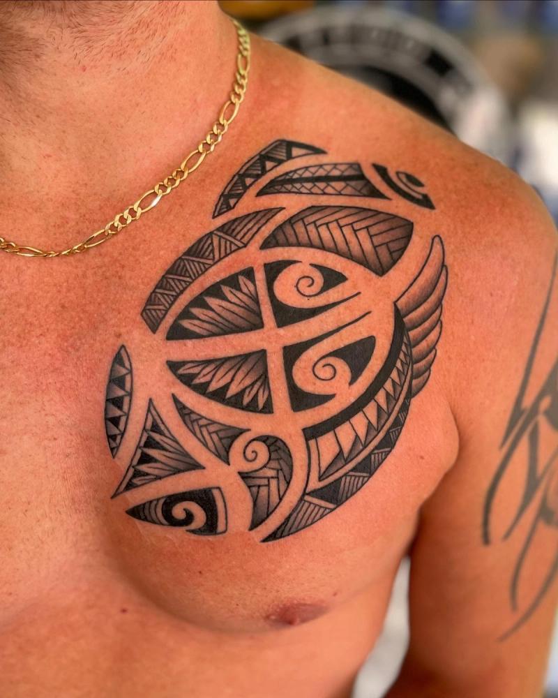 tribal tattoo on chest with turtle design