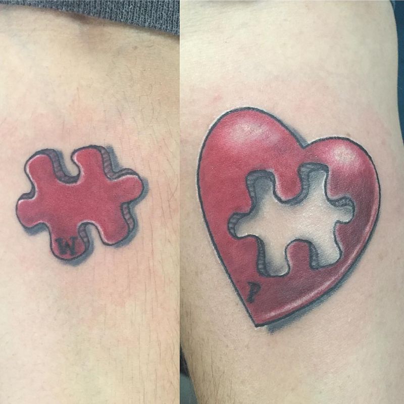 illustrative tattoo of a puzzle piece and a heart