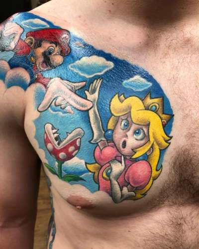 colorful illustrative tattoo of video game characters on the chest
