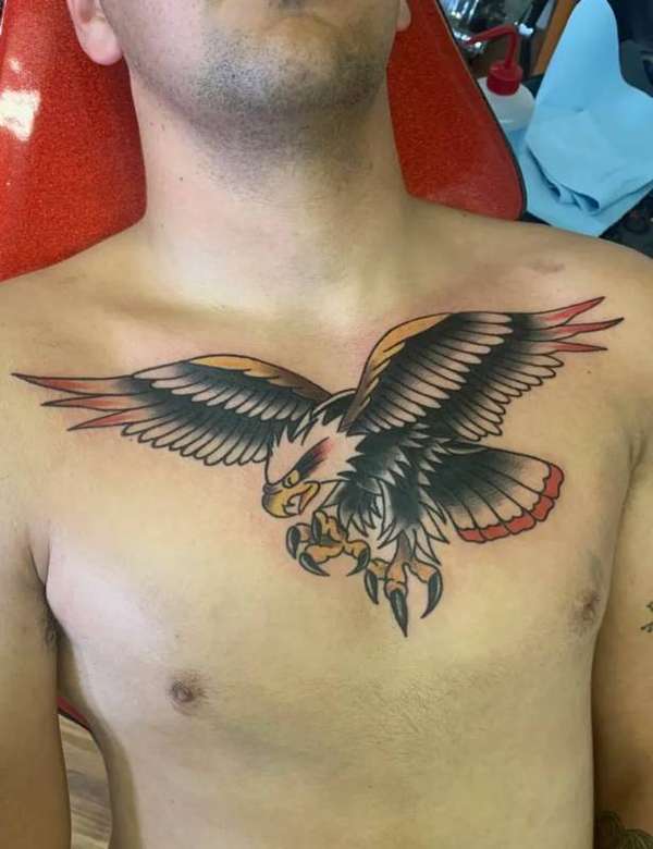 Colorful traditional eagle tattoo on chest