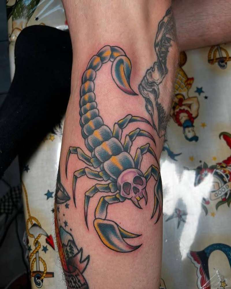 Colorful Neo Traditional tattoo of a scorpion with a skull on calf