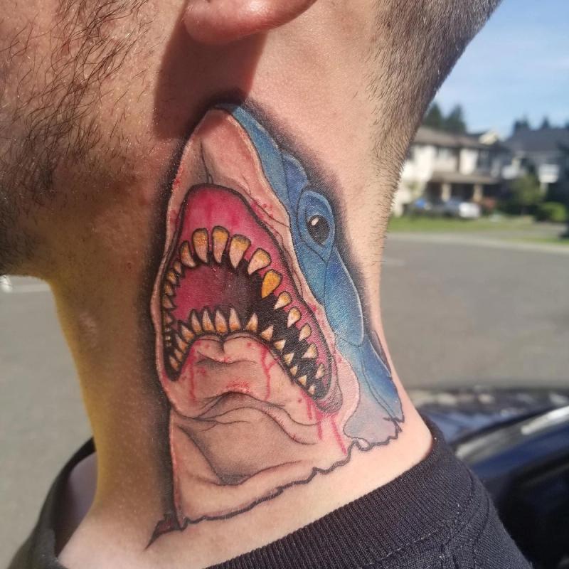 colorful shark tattoo on neck