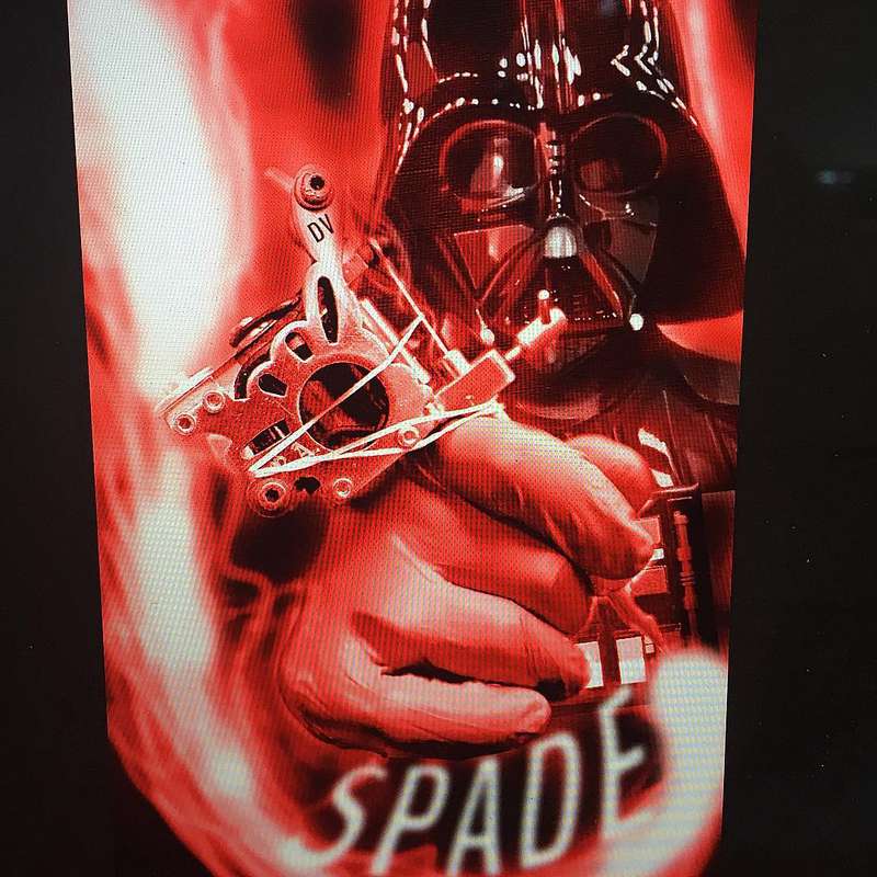 realistic darth vader red tattoo on forearm