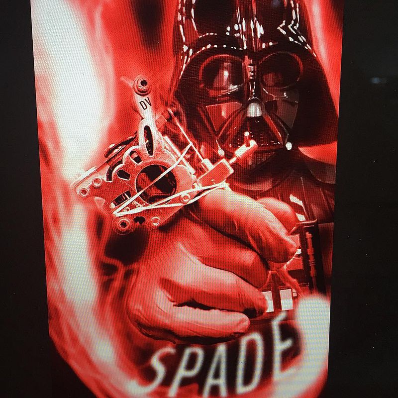 realistic darth vader red tattoo on forearm