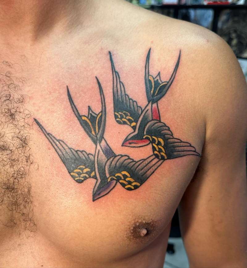 traditional swallow birds tattoo on a chest