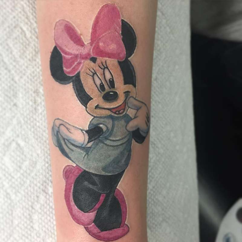 cartoon character tattoo on forearm in color