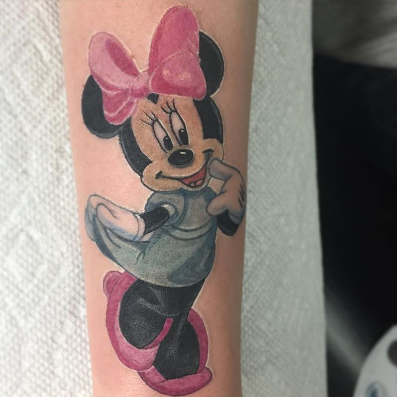 cartoon character tattoo on forearm in color