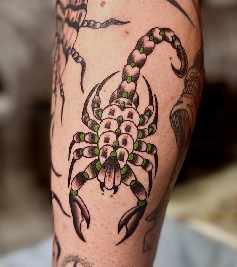 traditional scorpion tattoo on calf