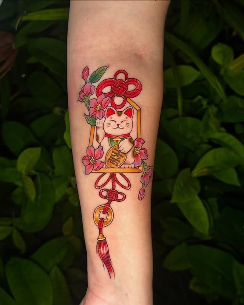 Color neotraditional lucky cat tattoo on forearm