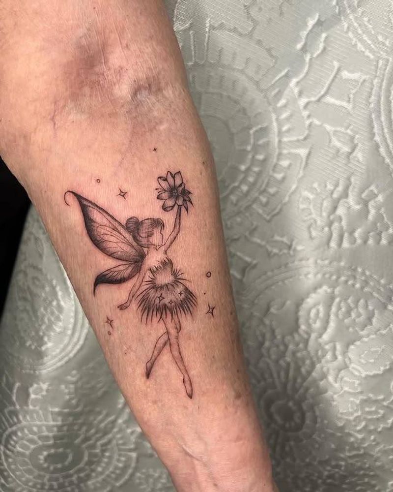 Black and grey fine line fairy tattoo on forearm