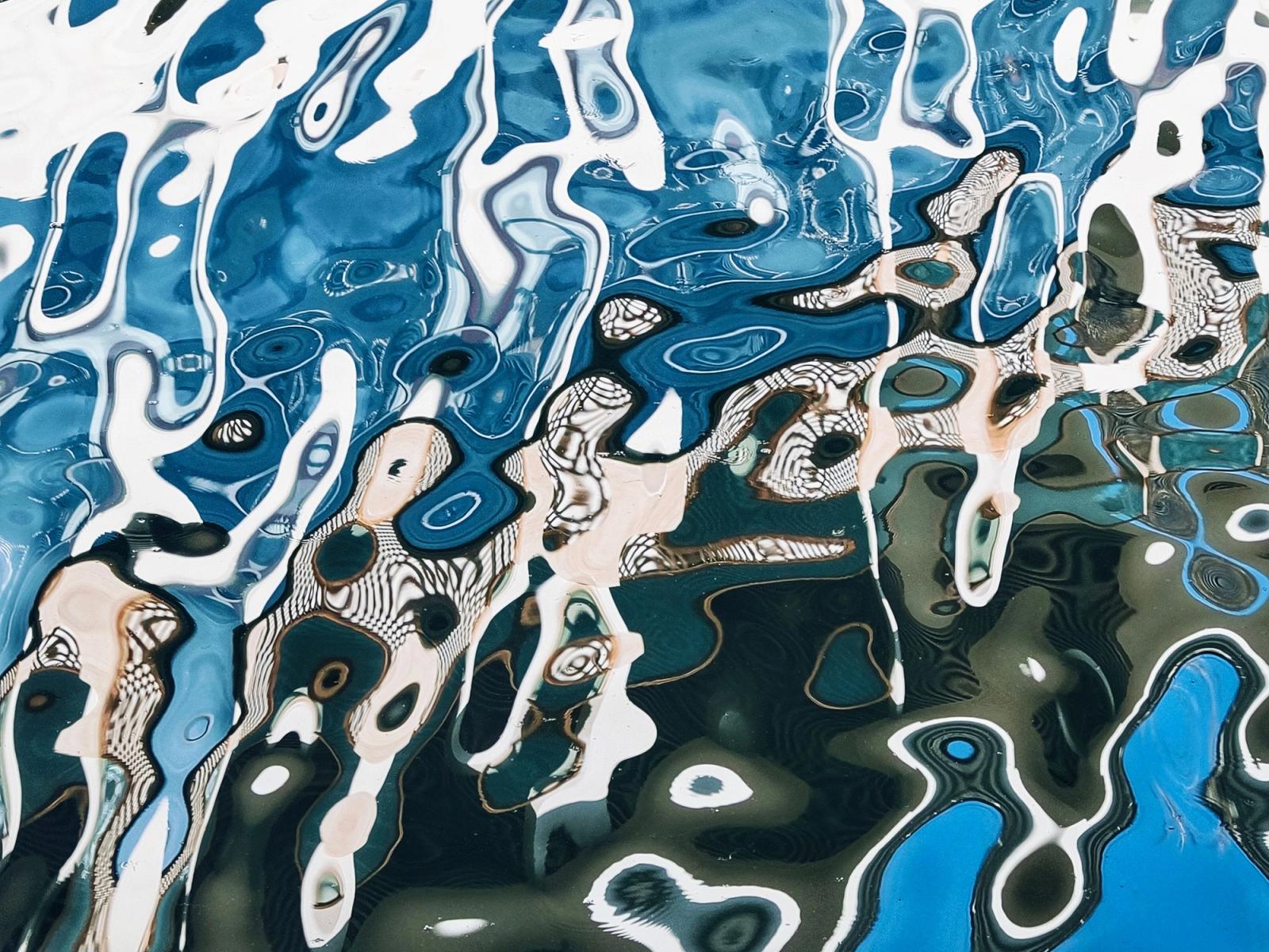 Rippling blue water reflections