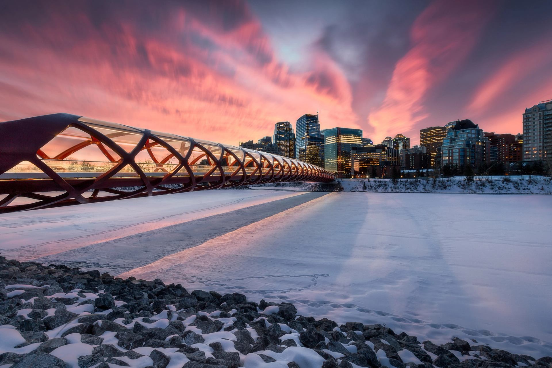 Winter sunrise/sunset scene of Peace Bridge in Calgary