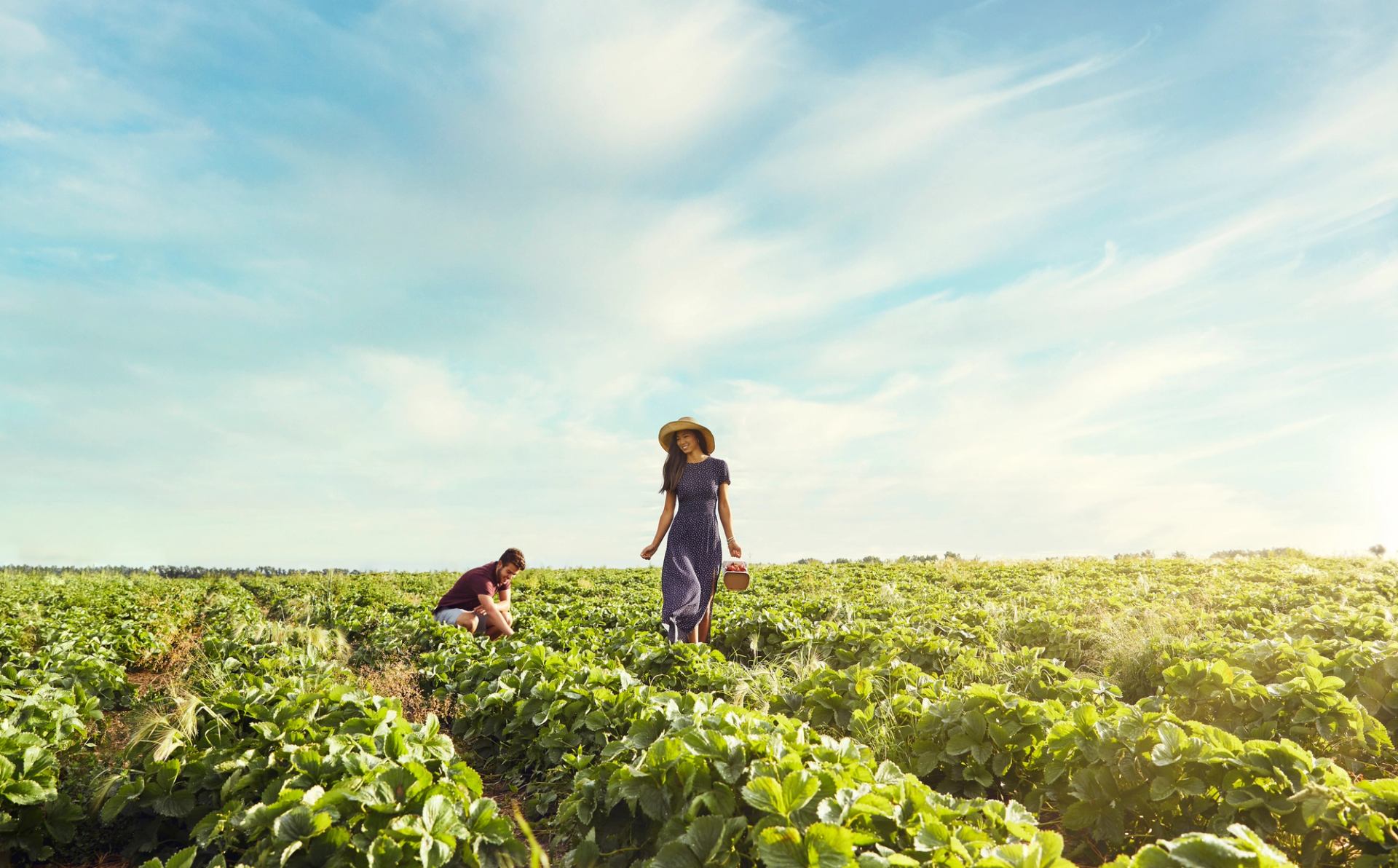 A woman is walking through the Jungle Farm located in Red Deer