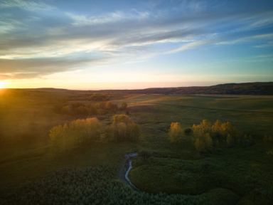 Aerial view of Yamnuska Wolfdog Sanctuary’s surrounding land near Cochrane, Alberta.