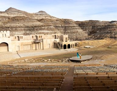 Indigenous dancer on stage at the Badlands Amphitheatre