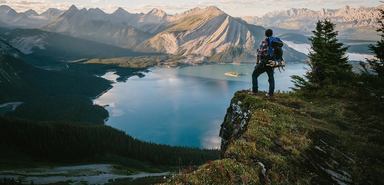 Hiker at Rawson Lake viewing Sarrail Ridge
