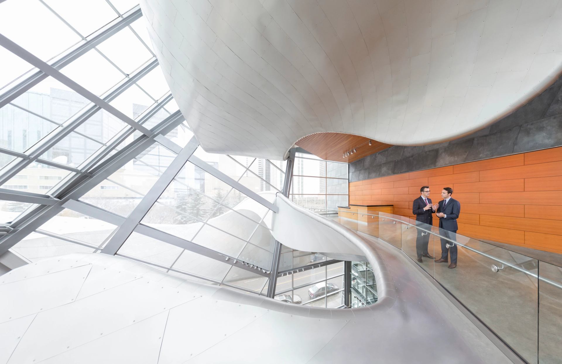 Businessmen meeting inside the Art Gallery of Alberta in Edmonton