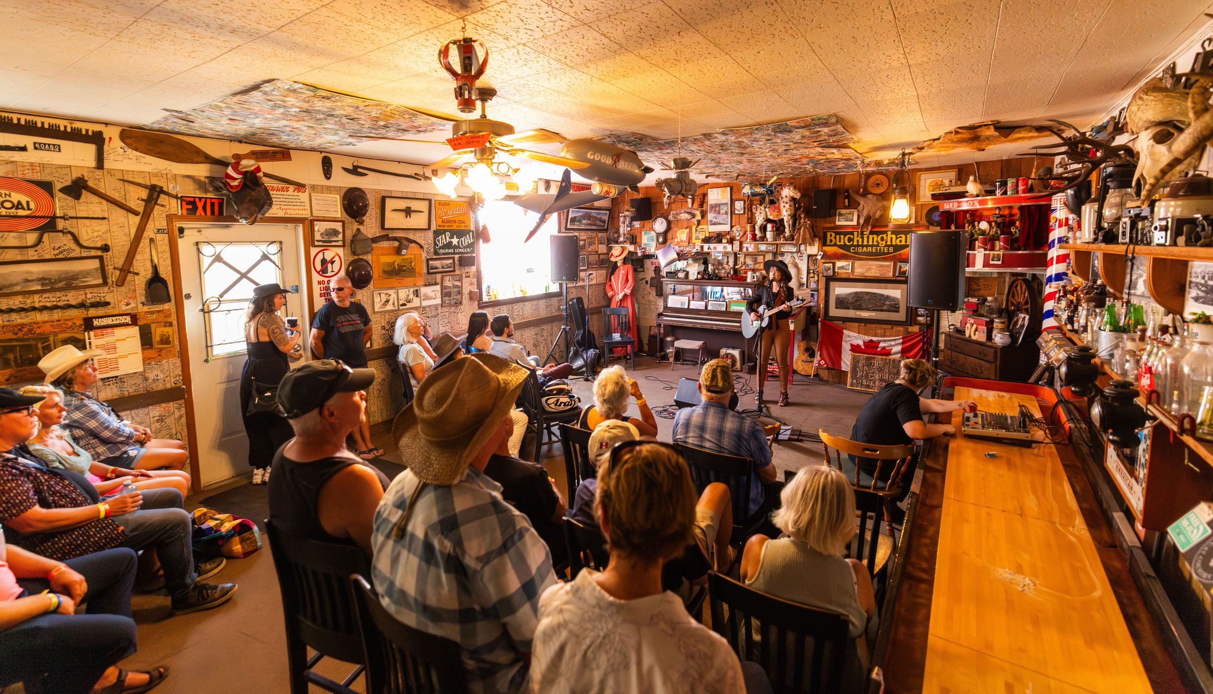 Musicians performing to fans at WayneStock in Drumheller.