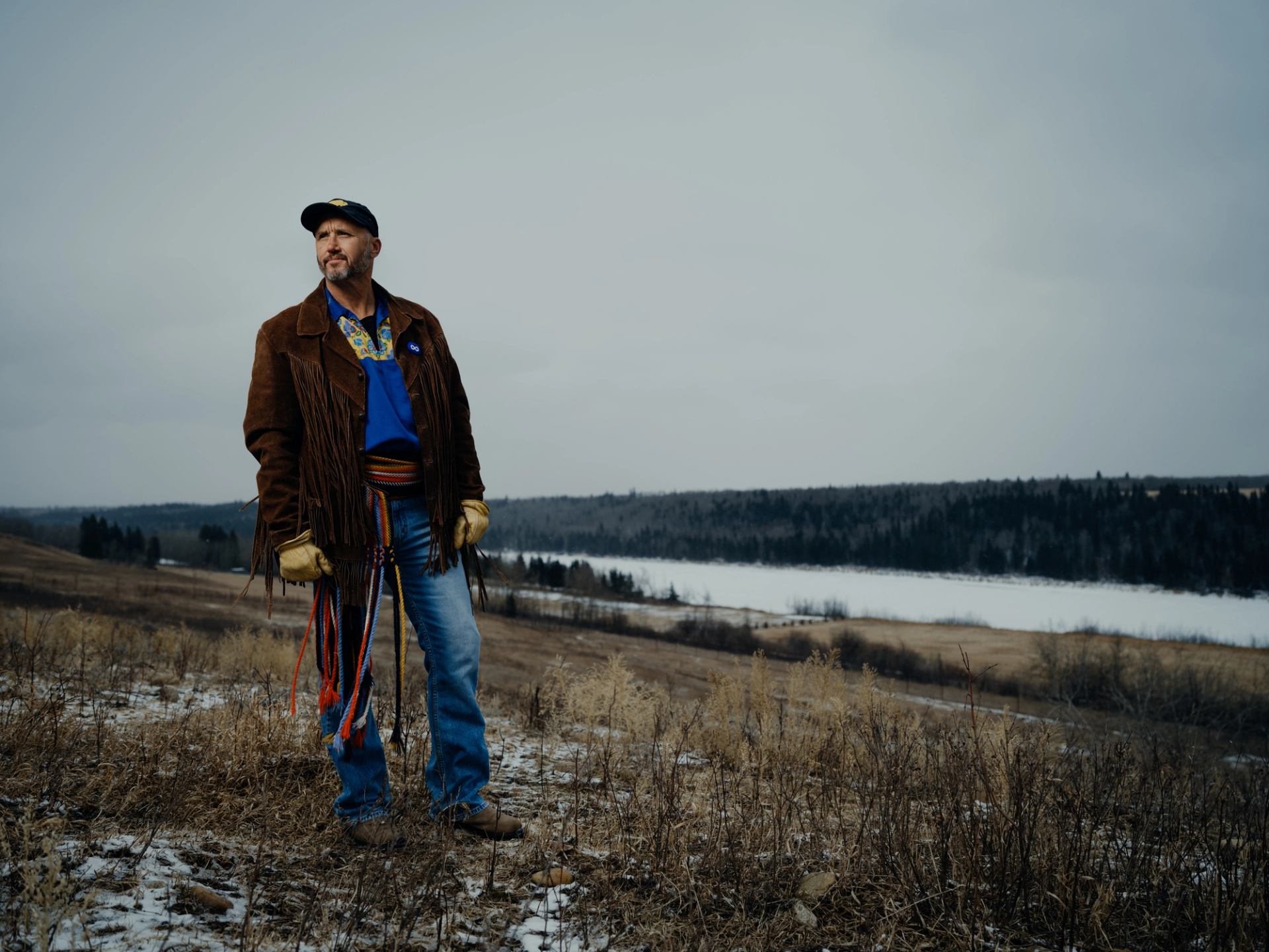 Portrait of Joe Urie as he stands on a ridge