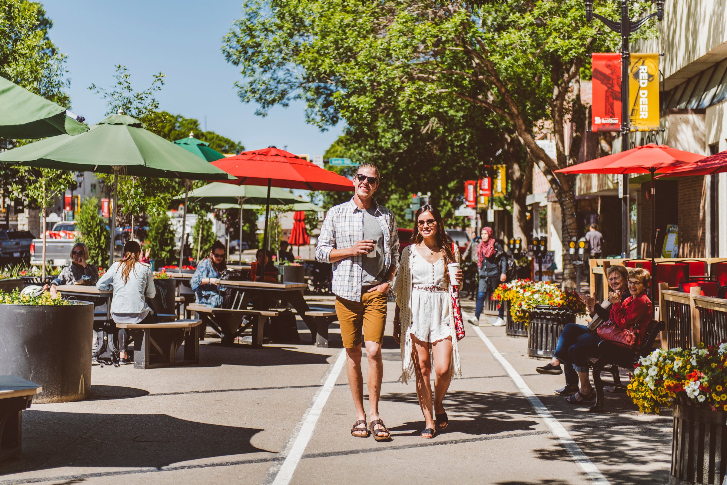 Couple walking in downtown Red Deer.