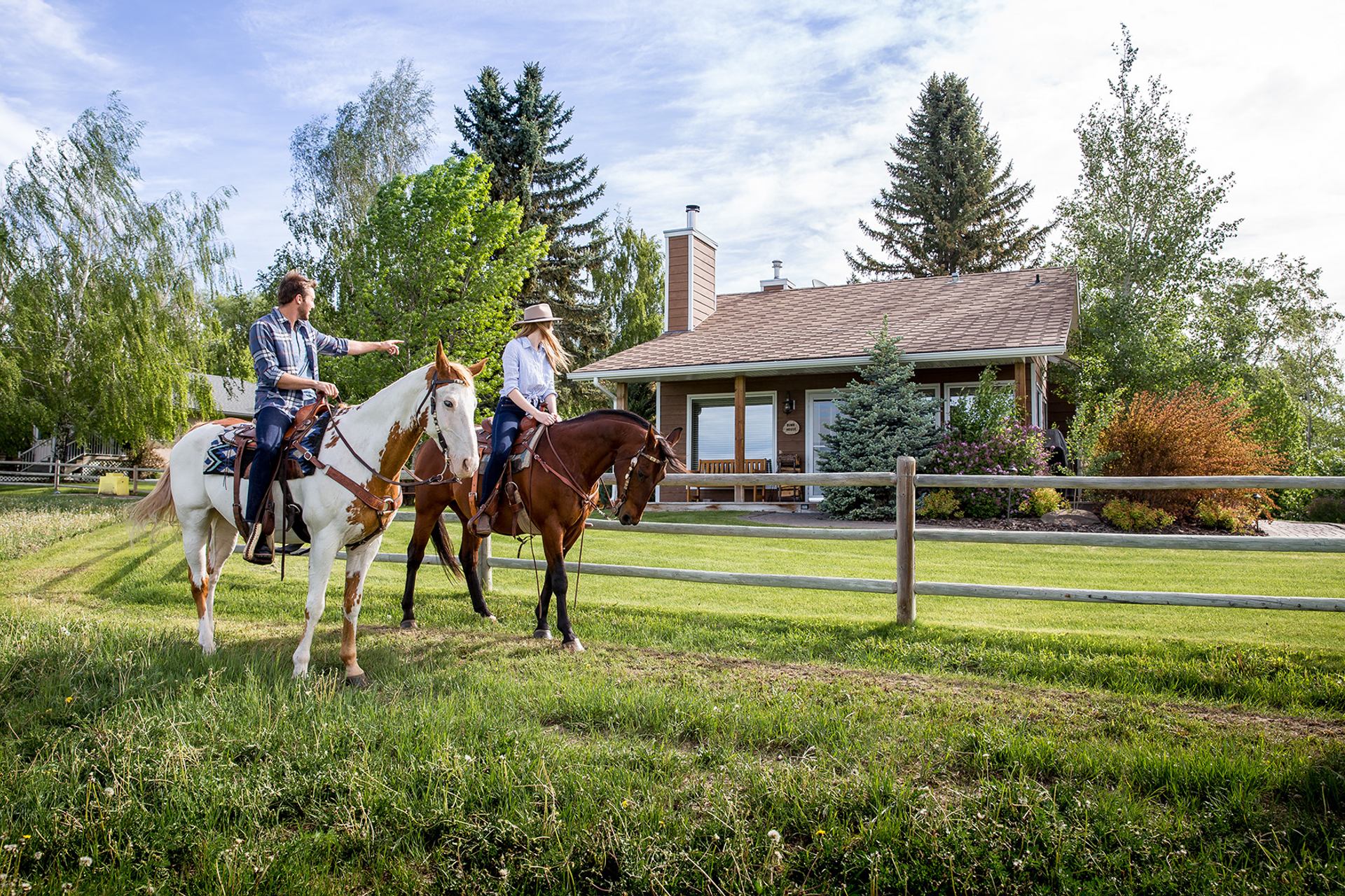 Guests horseback riding, Canadian Badlands.