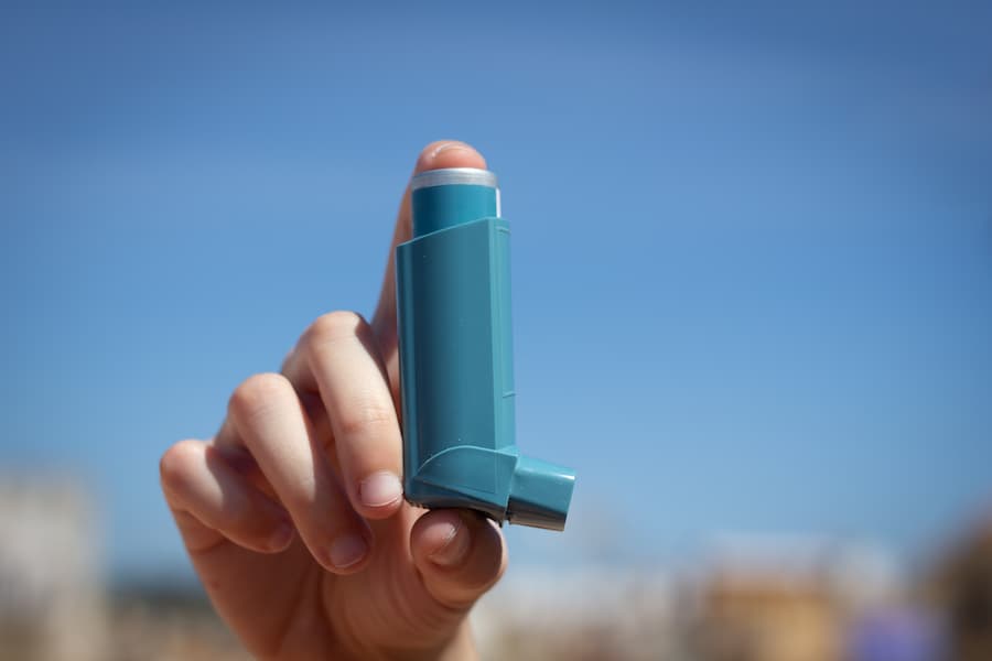 Hand holding up inhaler | The Allergy Group Idaho Inhaler Care