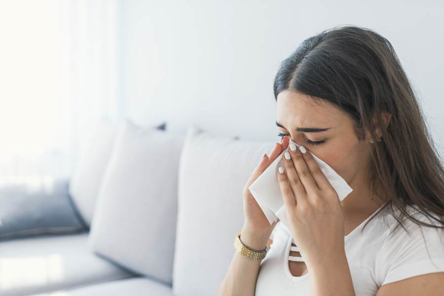 Woman suffering from chronic sinus infections | The Allergy Group Boise
