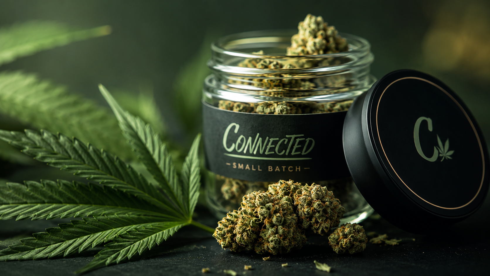 A premium cannabis flower jar with frosty green buds, cannabis leaves, and the Connected Small Batch branding in a dark studio setting.