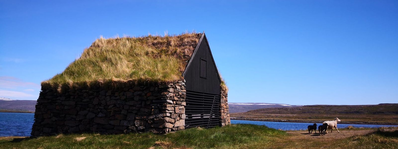 Vatnsfjord church and fish drying racks