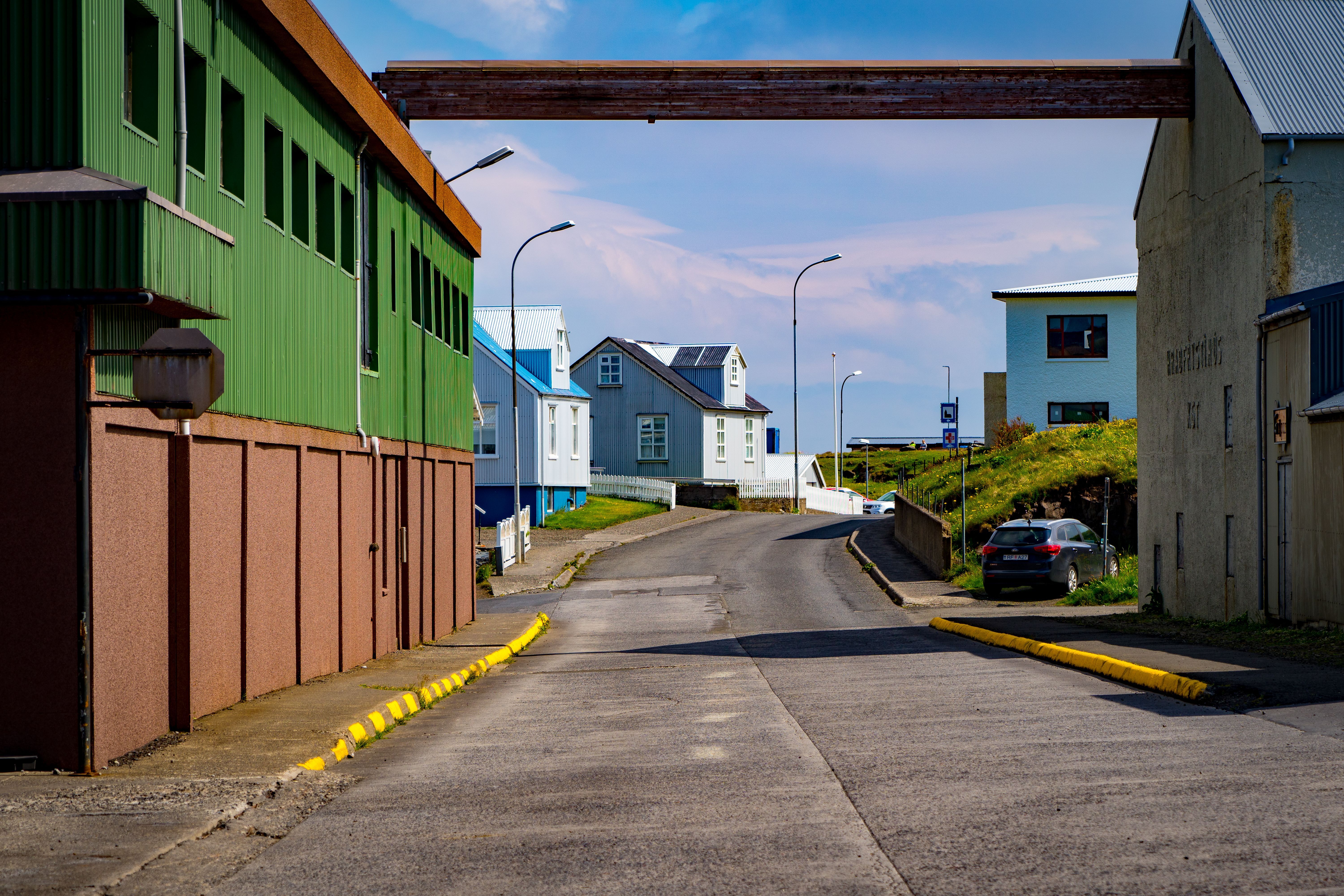 Colorful old harbour houses in Stykkishólmur with fishing boats
