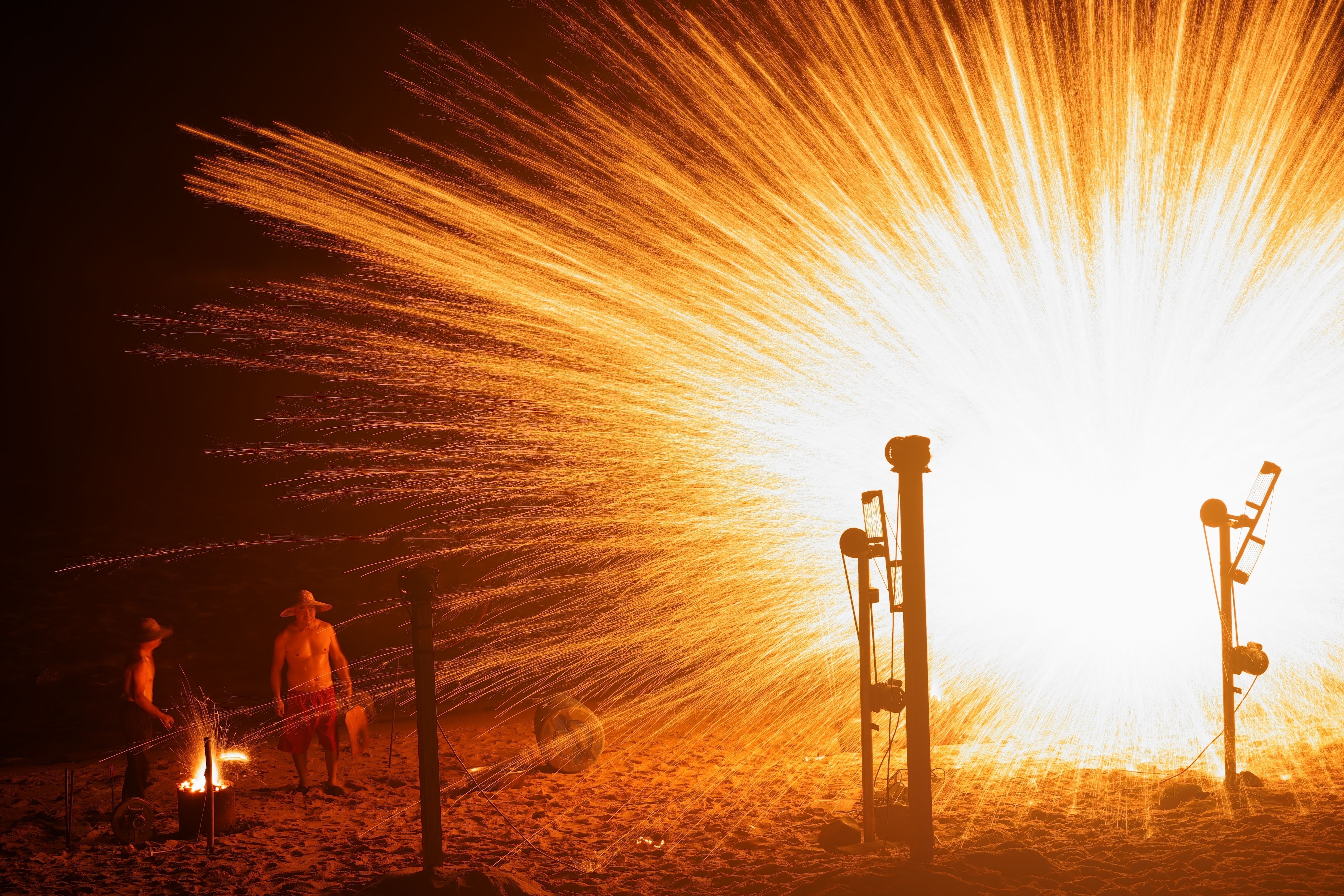 Bonfire and fireworks on a Catalan beach during the Sant Joan festival