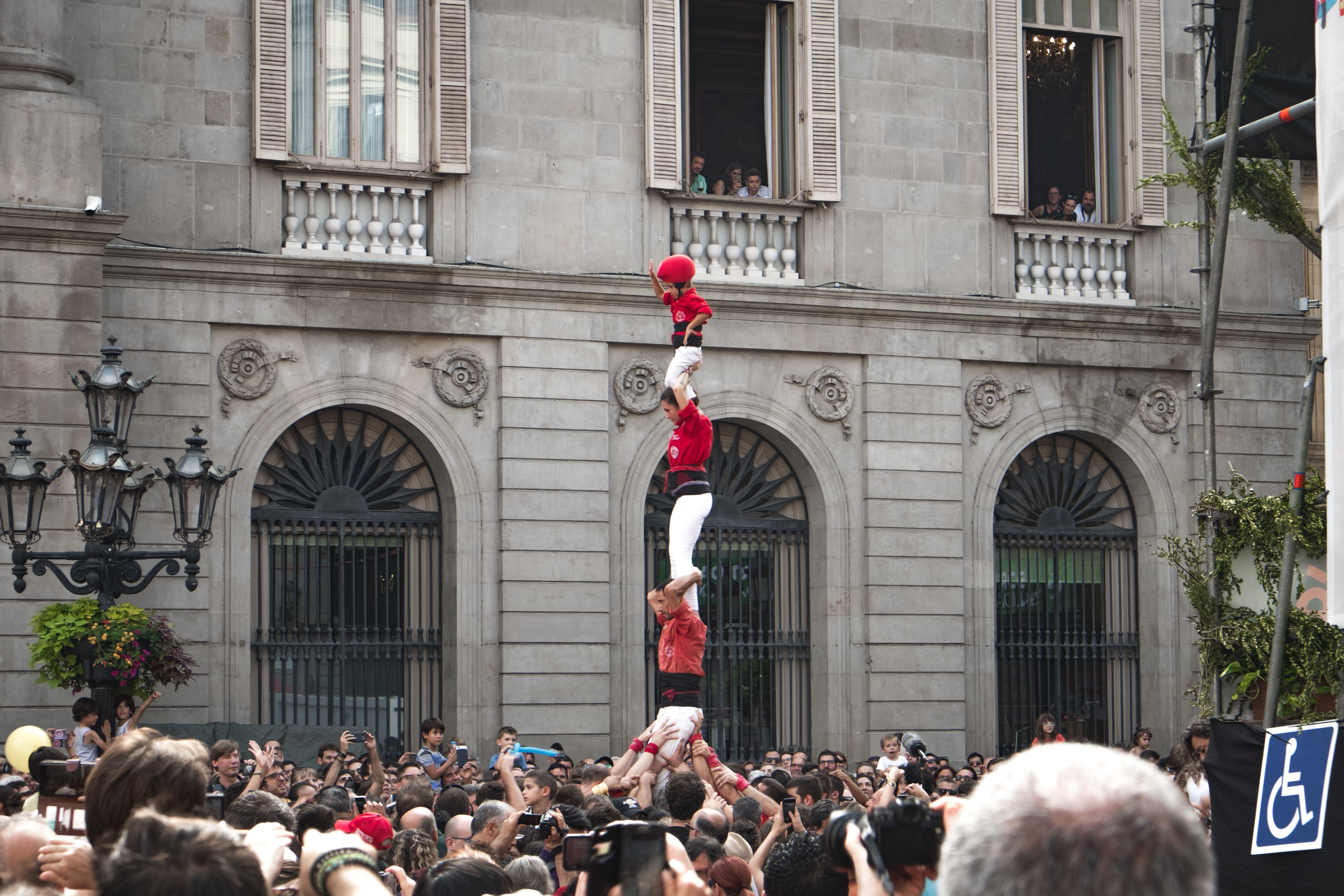 Castellers building a human tower during La Mercè festival in Barcelona