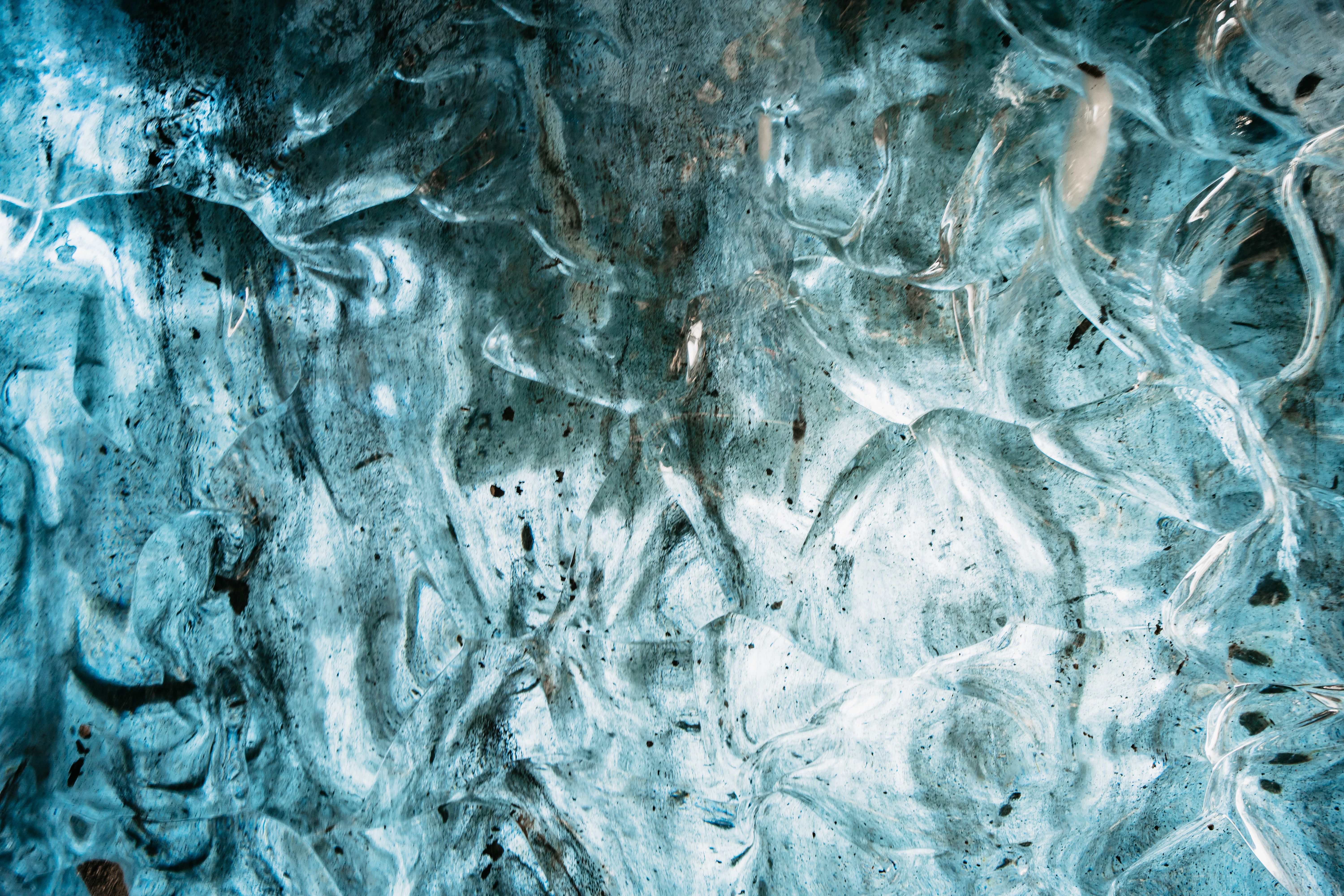 Blue ice cave inside Vatnajökull glacier in Iceland during winter