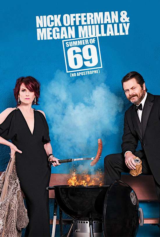 Megan Mullally and Nick Offerman having a barbeque. Megan grills a phallic sausage over flames.