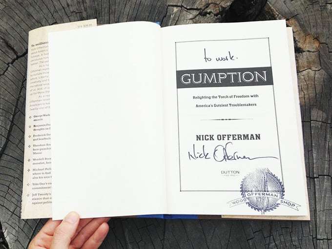 Interior cover page of Gumption with Nick Offerman’s inscription: To Work, and autograph. OWS stamp in bottom right corner of page.
