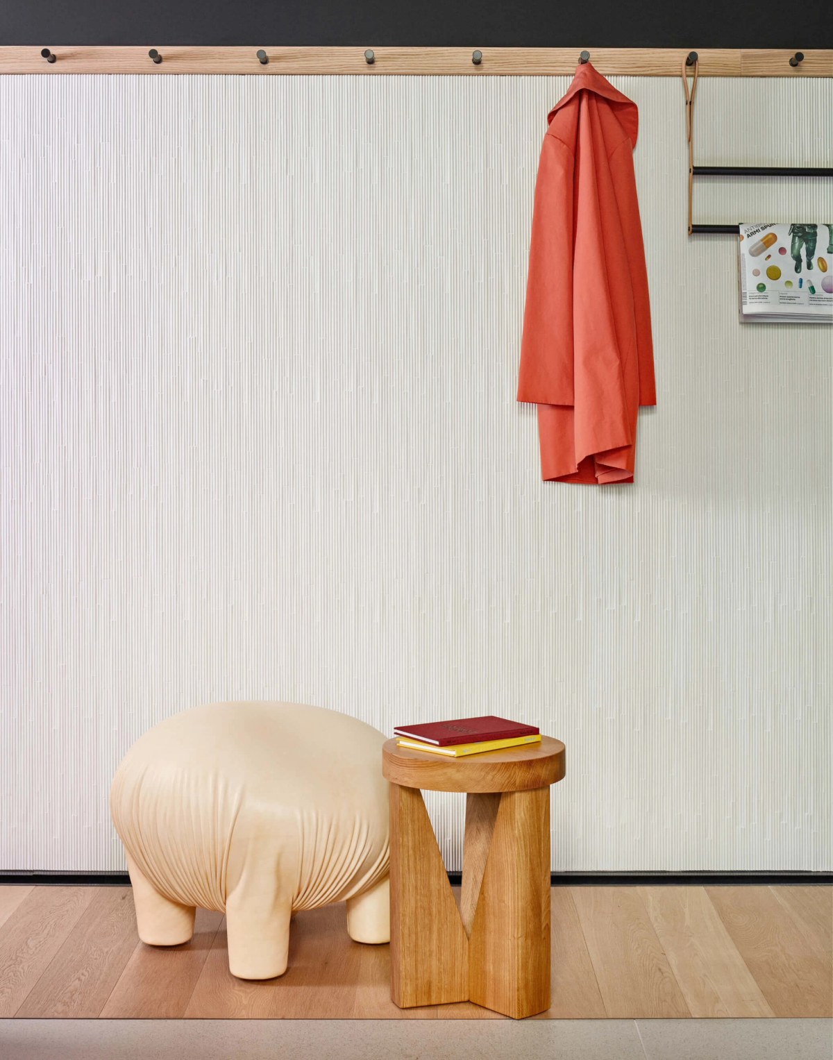 Tiles, objects and a red jacket