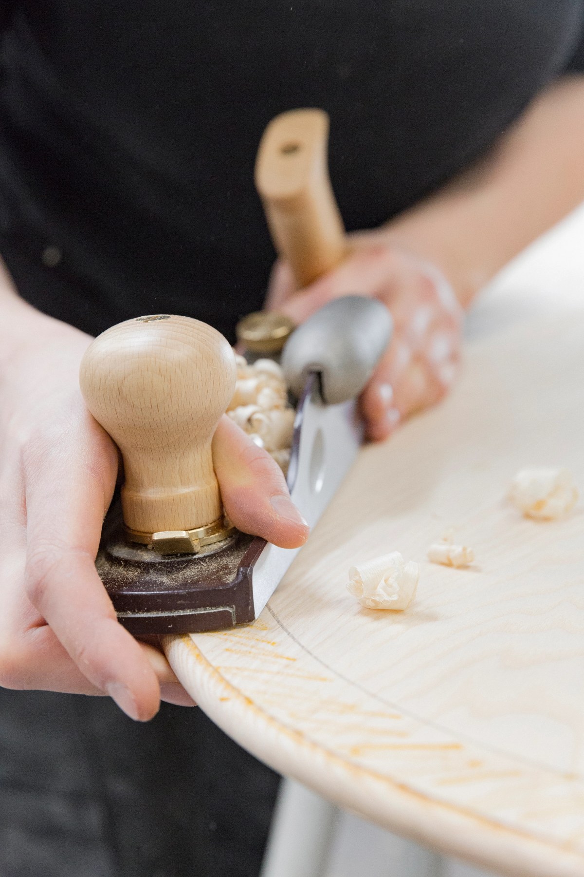 Handtool and wooden table top 
