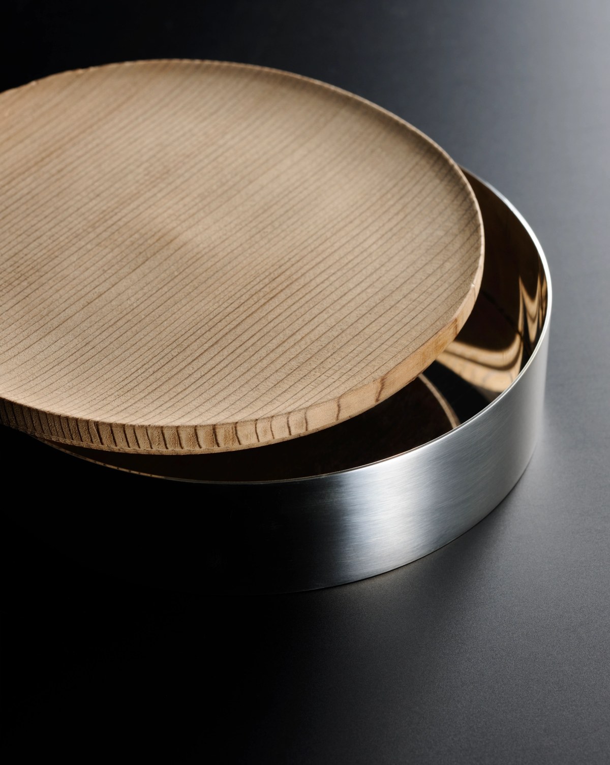 Handcrafted silver box with wooden lid
