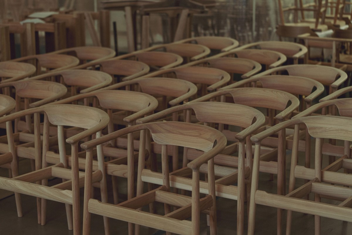 Line of wooden chairs at factory